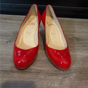Christian Louboutin Red Patent Leather Round-Toe Pumps